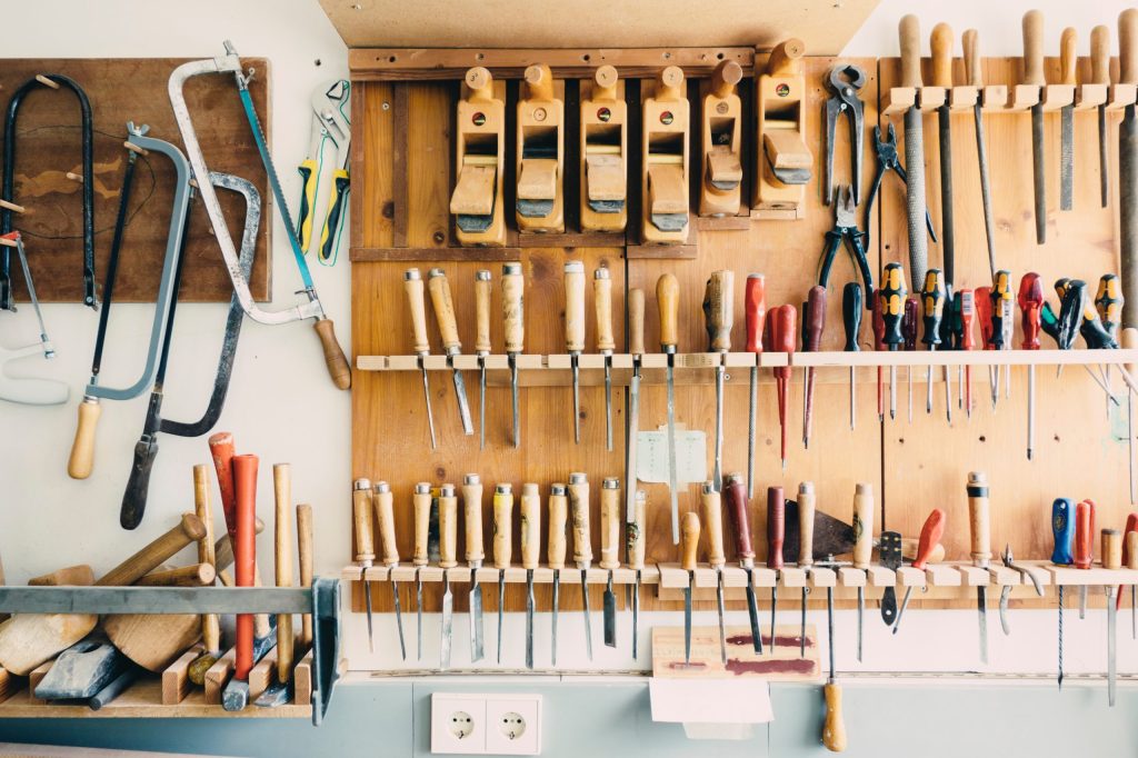 hardware tools organized on a typical garage wall as a metaphor for social media tools